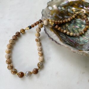 WEISHEIT DER ERDE Versteinertes Holz · vergoldet