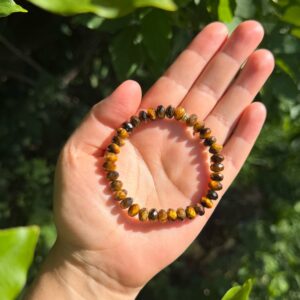 KRAFT DER ENTSCHEIDUNG Armband Tigerauge · facettiert